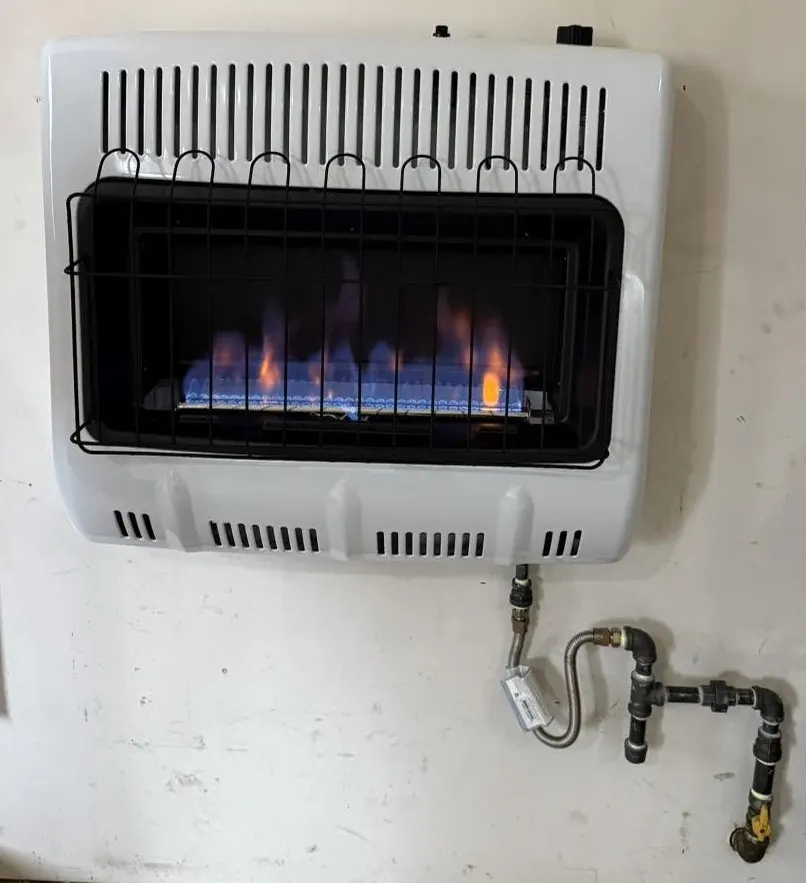 Installed natural-gas blue-flame wall heater with dedicated gas shutoff by Affordable Plumbing NEPA