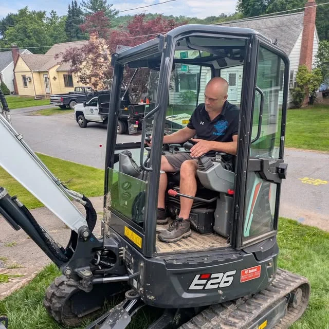 Jerry Riviello operating a Bobcat E26 mini excavator