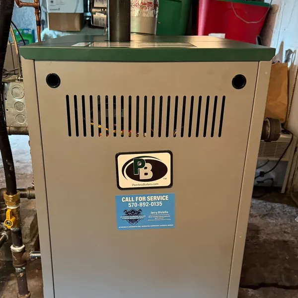 New Peerless natural-gas boiler installed in place of an oil boiler by Affordable Plumbing NEPA